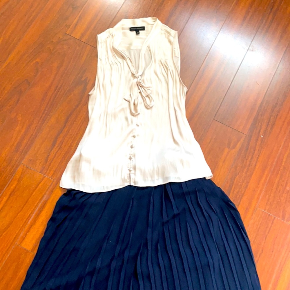 Silky cream sleeveless blouse